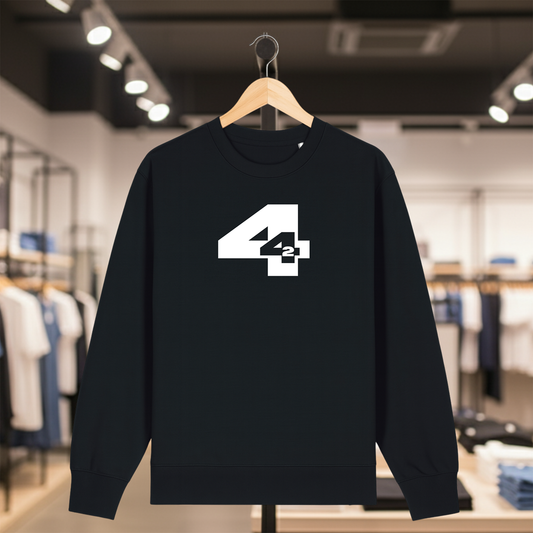 Black sweatshirt with 442 design on a hanger in a store setting