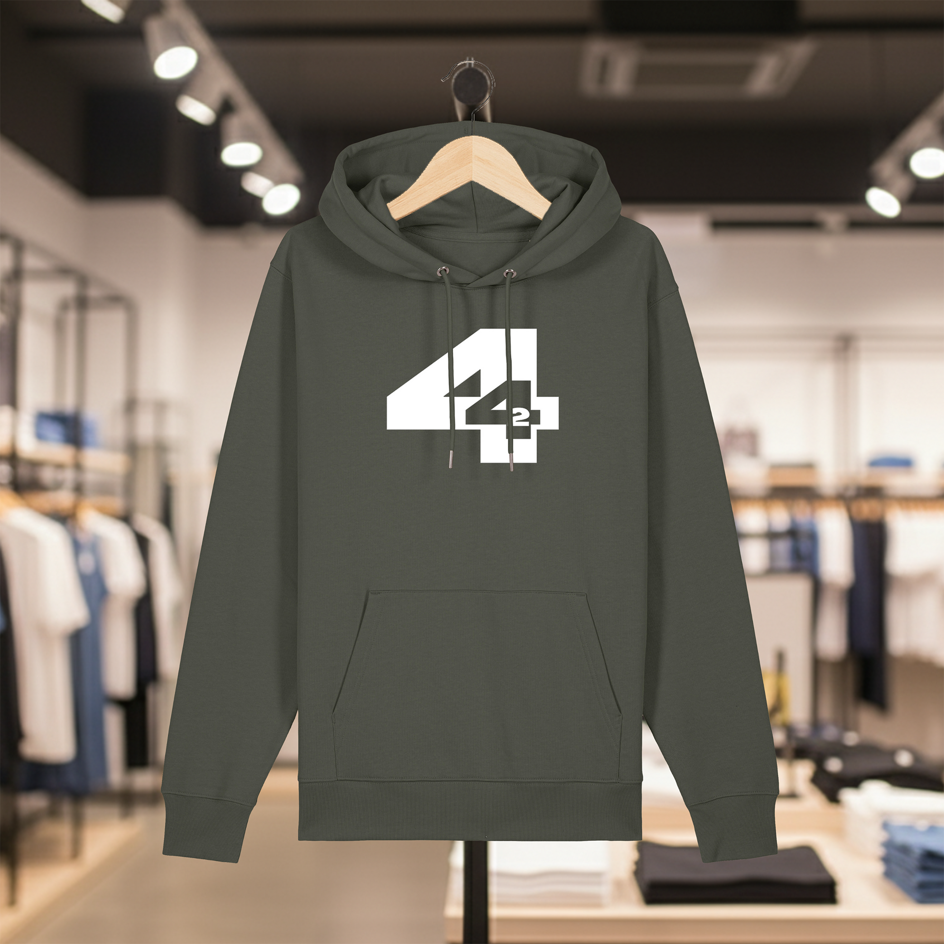 Khaki hoodie with a white text 442 on a hanger in a store setting