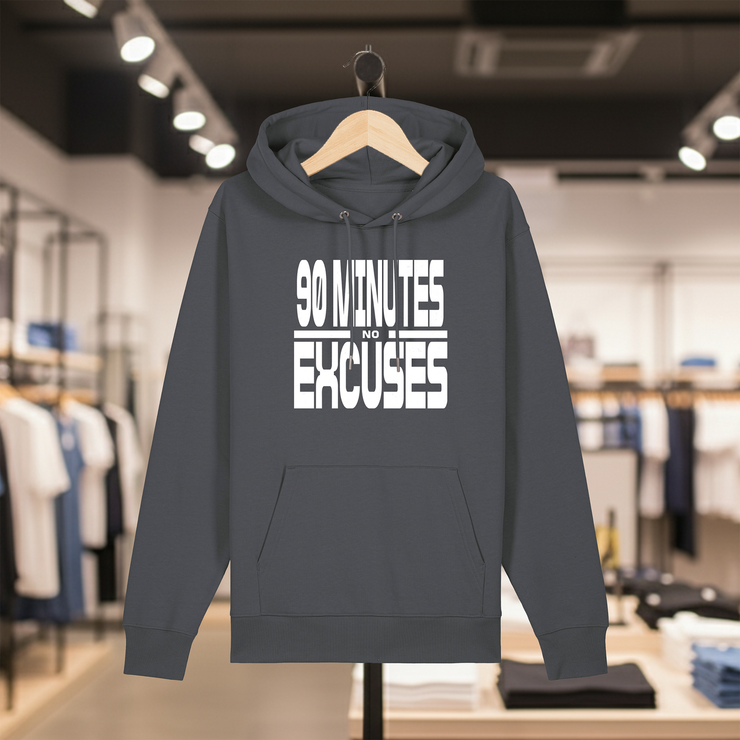 Grey hoodie with text 90 MINUTES NO EXCUSES on a hanger in a store setting
