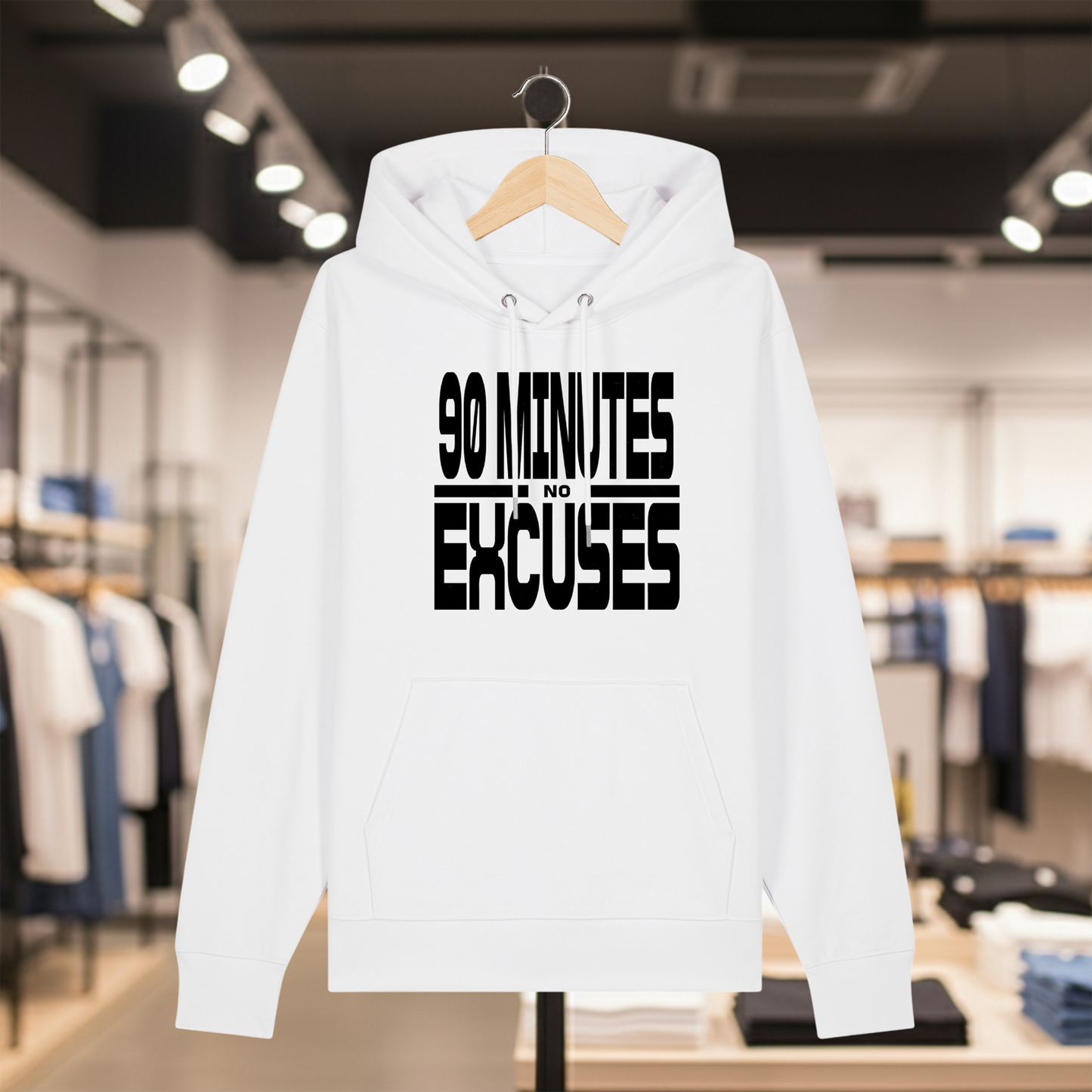 White hoodie with text 90 MINUTES NO EXCUSES on a hanger in a store setting