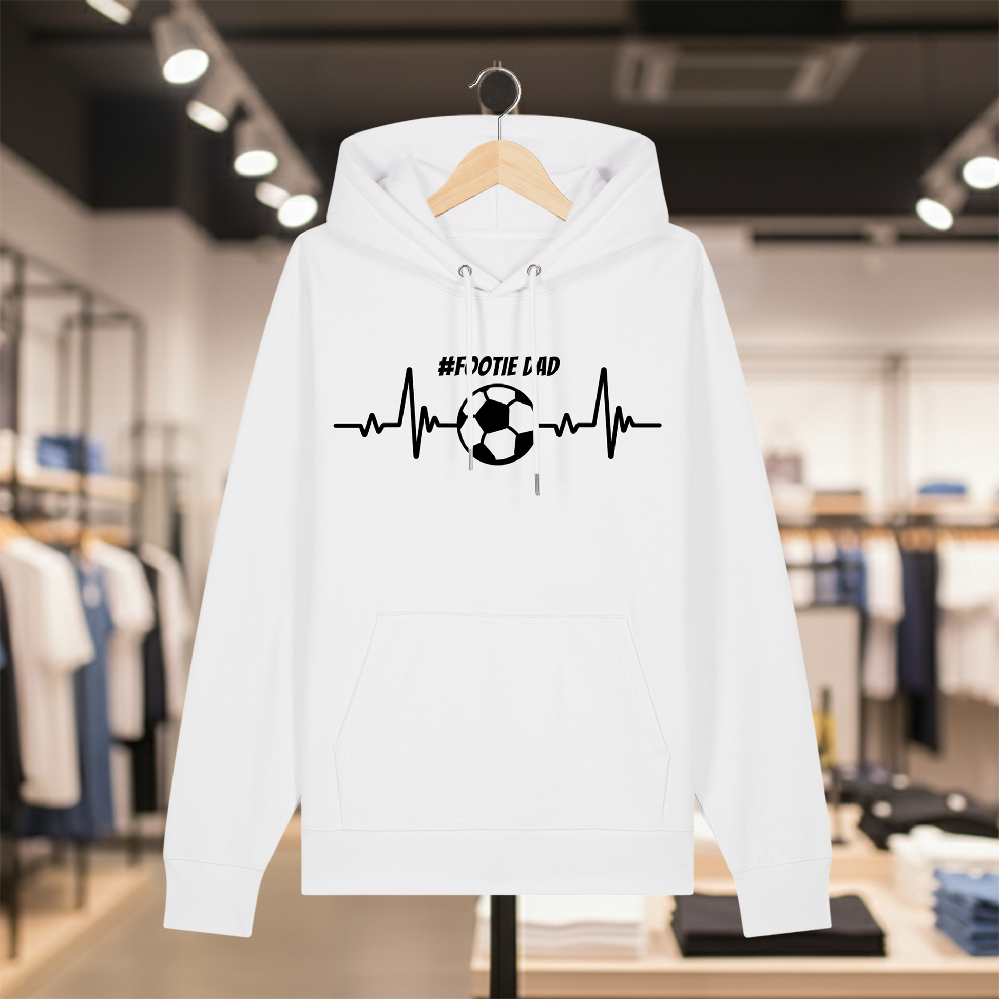 White hoodie with white text #FOOTIE DAD on a hanger in a store setting