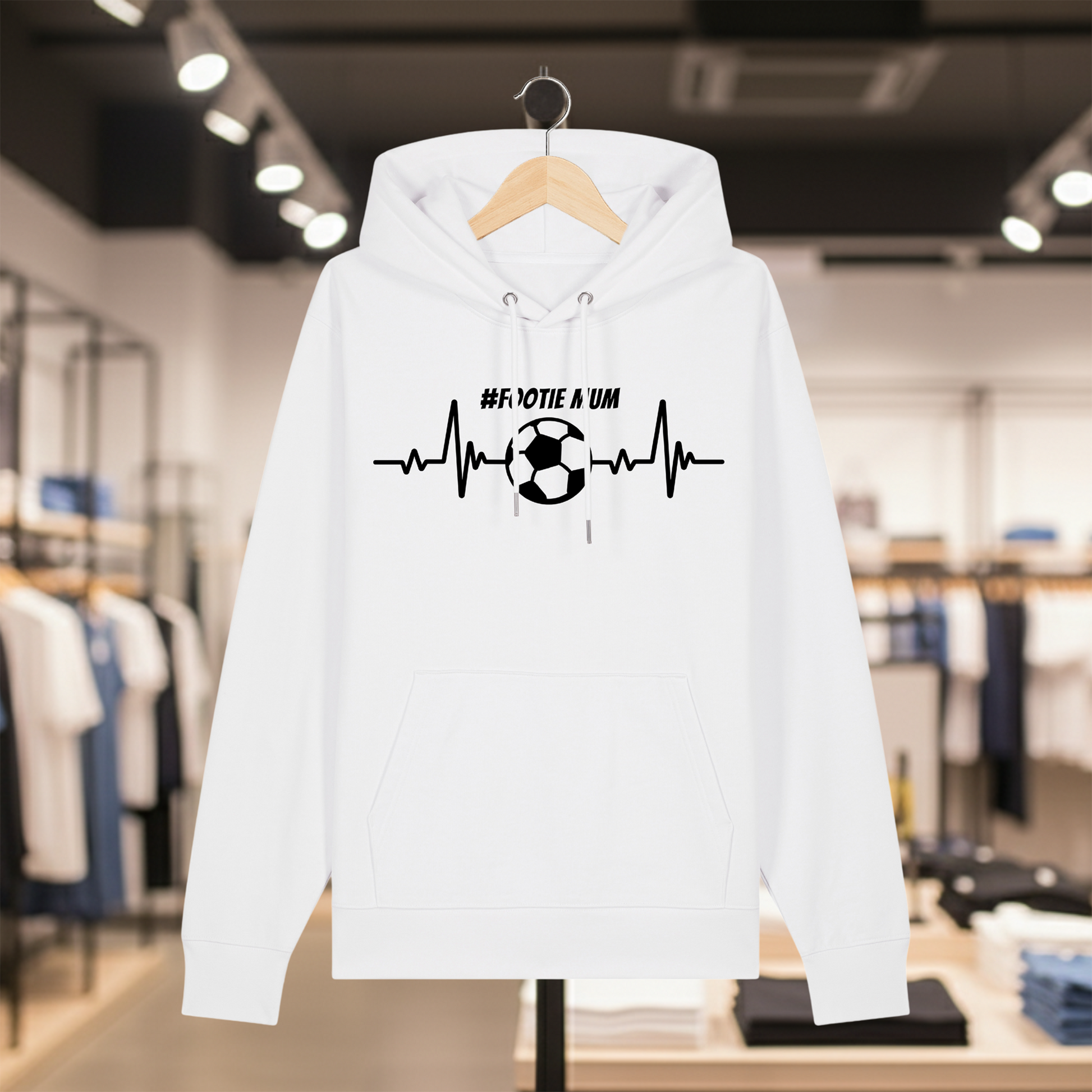 White hoodie with text #FOOTIE MUM on a hanger in a store setting