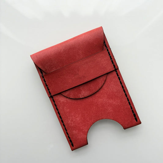  Red leather wallet on a white background 