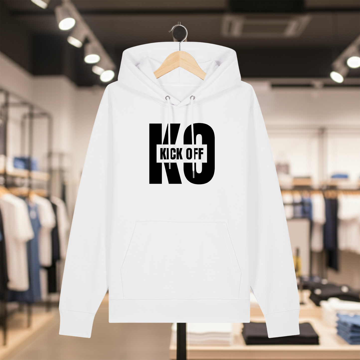White hoodie with white text KICK OFF on a hanger in a store setting