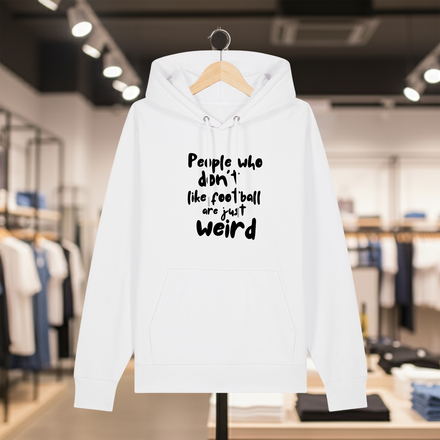 White hoodie with text PEOPLE WHO DON'T LIKE FOOTBALL ARE JUST WEIRD on a hanger in a store setting