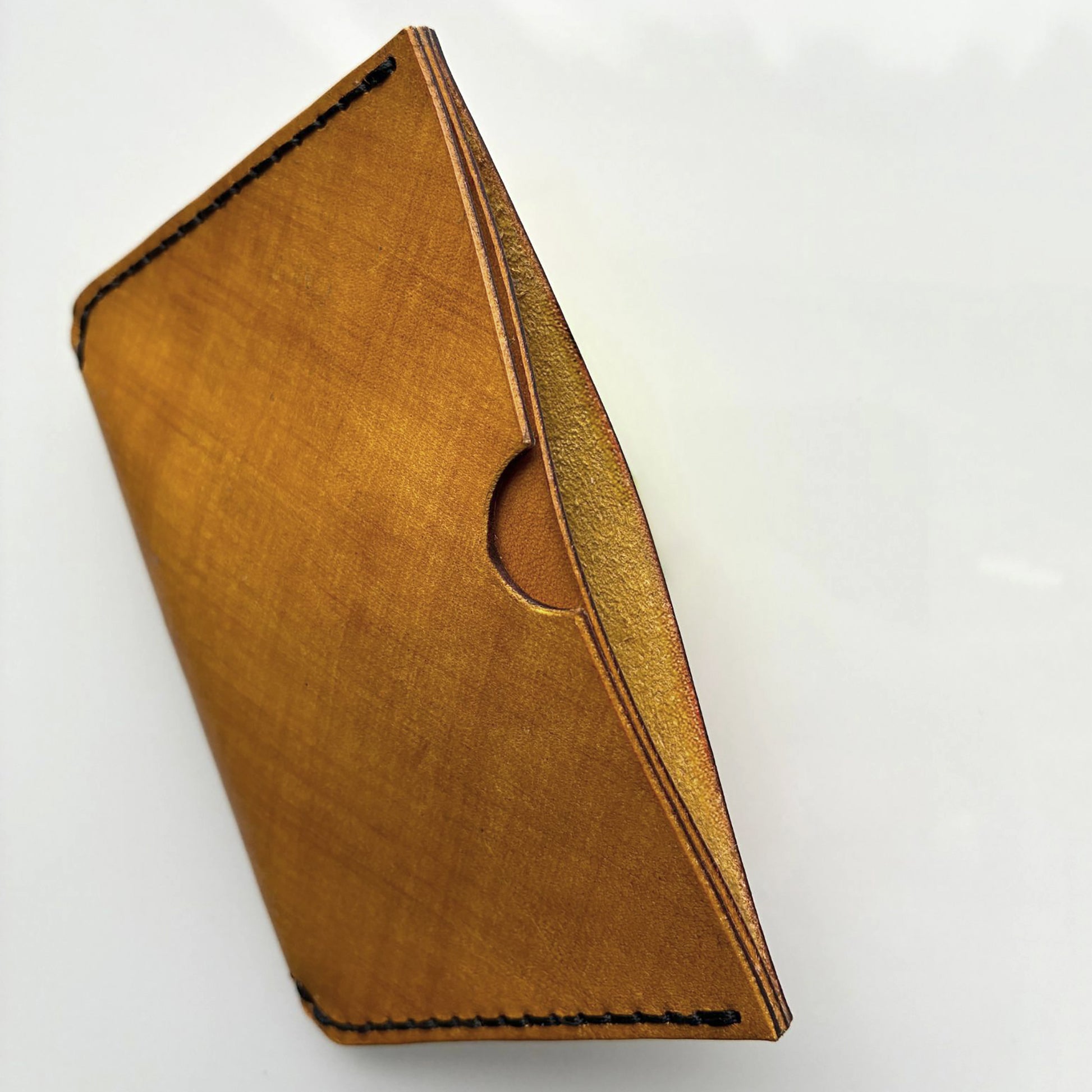 yellow leather wallet on a white background